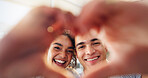 Heart hands, portrait and happy couple in home with love sign, support and smile for anniversary. Finger, frame or people in home with kindness emoji, romance or care for valentines day or bonding