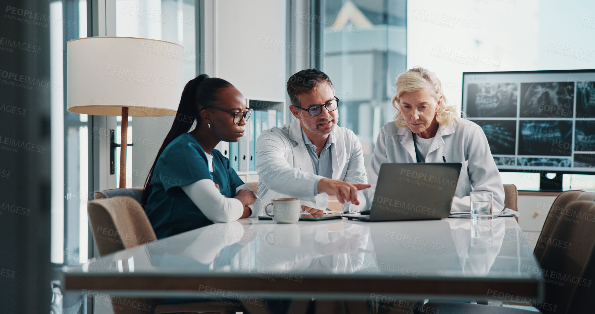 Buy stock photo Hospital, teamwork and doctors on laptop in meeting for consulting, discussion and medical advice. Healthcare, clinic and man and women on computer for collaboration, research or telehealth website