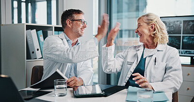 Buy stock photo People, doctors and meeting with high five at hospital for study success, lab results and celebration. Happy, staff and collaboration with radiology achievement, medical report and treatment solution