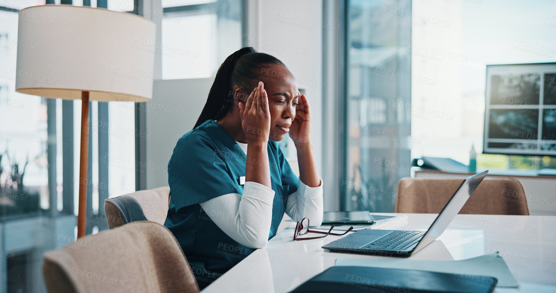 Buy stock photo Headache, black woman and doctor with laptop in hospital boardroom for stress, burnout or pain. Migraine, computer and African female healthcare worker with medical emergency planning in clinic.