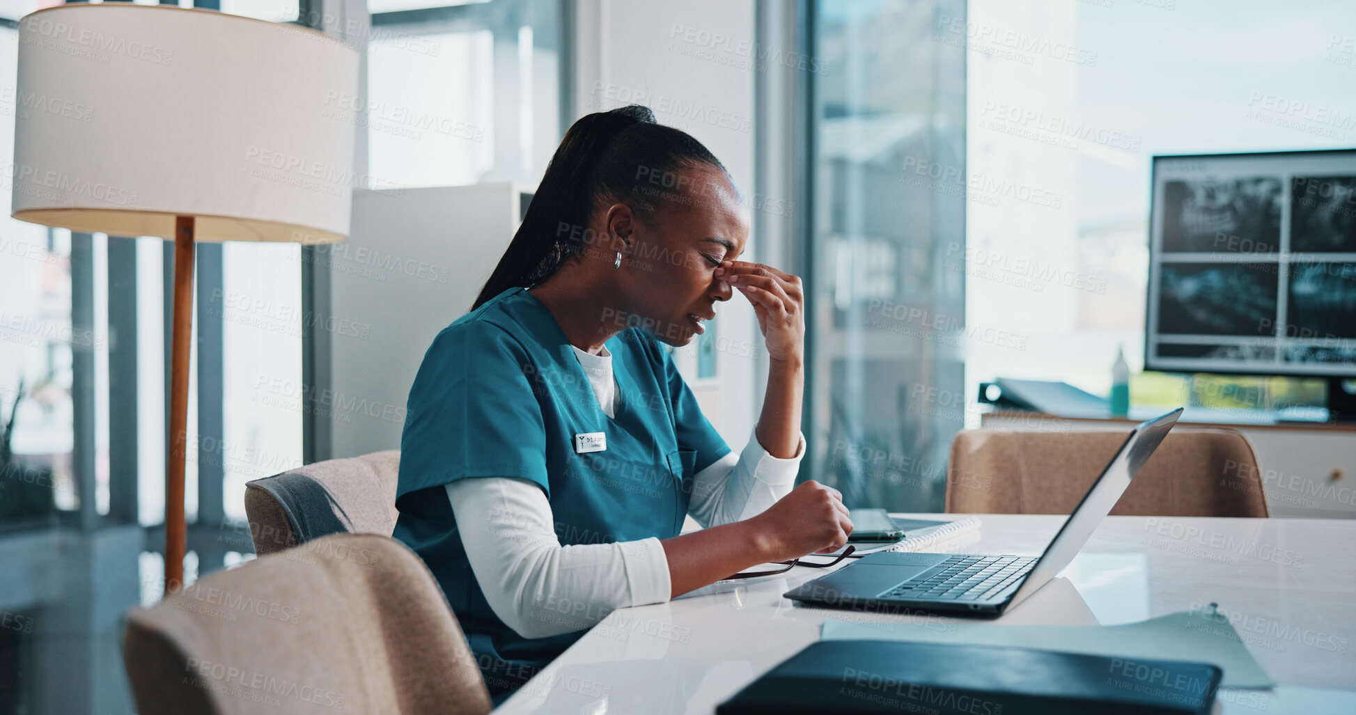 Buy stock photo Headache, black woman and doctor with laptop in clinic boardroom for stress, burnout or mistake. Migraine, computer and African healthcare worker with MRI scans for medical emergency plan in hospital