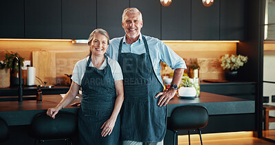 Buy stock photo Portrait, chef and mature people in kitchen, happy and apron for cooking in home and small business. Confident, man and woman with catering company, partnership and entrepreneur with culinary skills