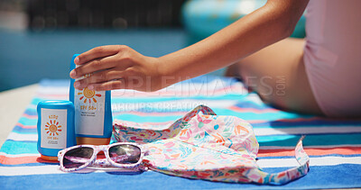 Buy stock photo Sunscreen, sunglasses and hat with hand at swimming pool for uv rays protection, spf cream or summer vacation. Sunblock lotion, dermatology and closeup of child outdoor at holiday resort for skincare