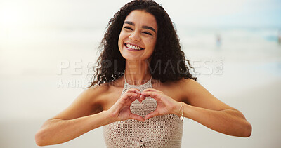 Buy stock photo Happy woman, portrait and beach with heart hands for summer vacation, love or support in nature. Face, female person or tourist with smile, emoji or shape for holiday getaway on ocean coast at sea