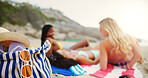 Bag, women and relax with beach for vacation, summer holiday or day ocean coast in nature. Back, female people or friends lying with equipment for getaway, sunshine or picnic on sandy shore at sea