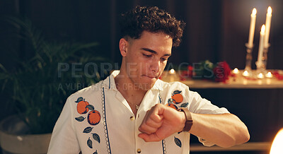 Buy stock photo Romance, waiting and man with watch, restaurant or late dinner date, impatient or valentines day. Night, worry and person with reservation for anniversary, fine dining or time for celebration