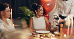 Couple, waiter and red wine on date at restaurant for valentines day, romantic dinner and celebration. People, alcohol glass and cuisine meal with fine dining, anniversary and relationship commitment