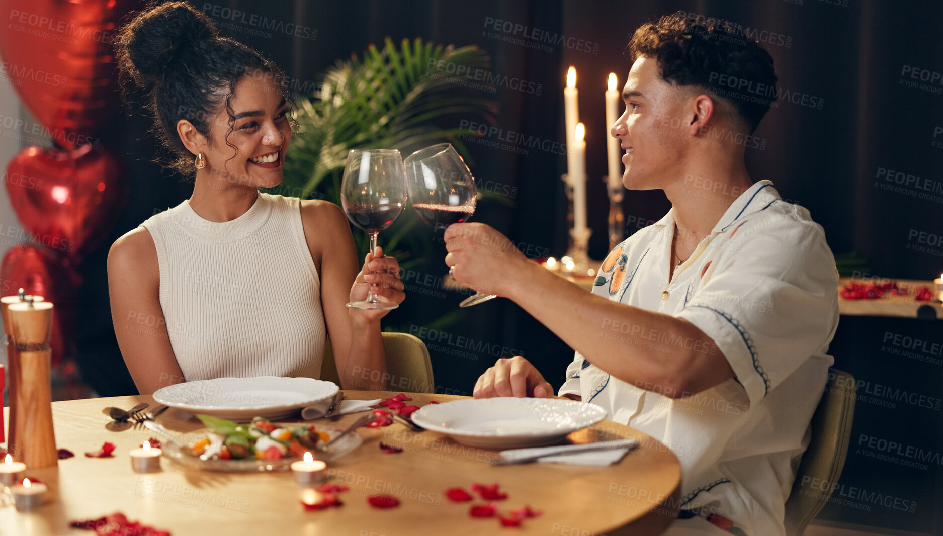 Buy stock photo Couple, cheers and red wine on date at restaurant for valentines day, romantic dinner and celebration. People, toast alcohol and cuisine meal with fine dining, anniversary and relationship commitment