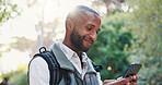 Nature, black man and smile with phone for hiking, checking location or social media on adventure. Outdoor, male person and tourist with mobile for trekking, travel or application for trail direction