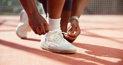 Buy stock photo Person, hands and tying shoes with fitness for sport, workout or outdoor exercise on turf or court. Closeup, athlete or runner getting ready with tie or sneakers for game, match start or preparation