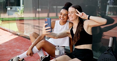 Buy stock photo Sports, peace sign and selfie of friends on court for training, match and playing game. Fitness club, racket and happy women smile for exercise, workout and practice with photo for social media