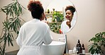 House, mirror and woman in bathroom, lip gloss and wellness with grooming, skincare and routine. Person, apartment and girl with reflection, soft skin and cosmetics with beauty, shine and morning