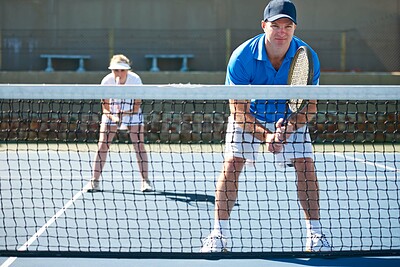 Buy stock photo Tennis match, couple and team in outdoors, competition and playing on court at country club. People, training and exercise or racket for game, performance and practice or collaboration and challenge