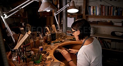 Buy stock photo Artist, woman and cutting with wood in workshop for craftsmanship, skill or handmade design with creativity. Woodwork, carpenter or creative person at workspace with equipment for handicraft or hobby