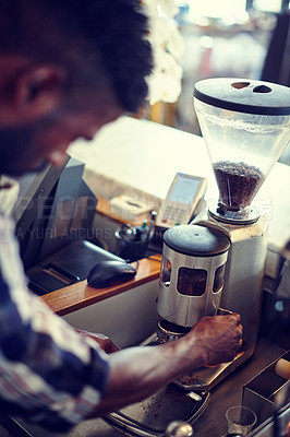 Buy stock photo Barista, man and coffee preparation with grinder machine for customer order, roast blend and fresh caffeine. Hospitality industry, hands and server with brewing process for beverage drink and service