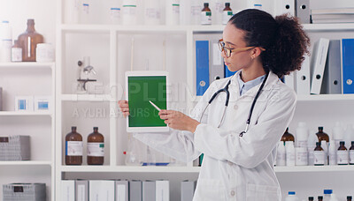 Buy stock photo Woman, doctor and tablet with green screen in lab for mockup, pointing and telehealth. Tech, female surgeon and chroma key in hospital for pharmaceutical research, show and medical advice for patient