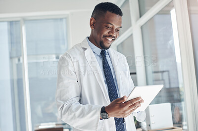 Buy stock photo Smile, medical and black man with tablet, office and telehealth in clinic, serious and online for healthcare. Workplace, hospital and internet for technology, doctor and science for research of staff