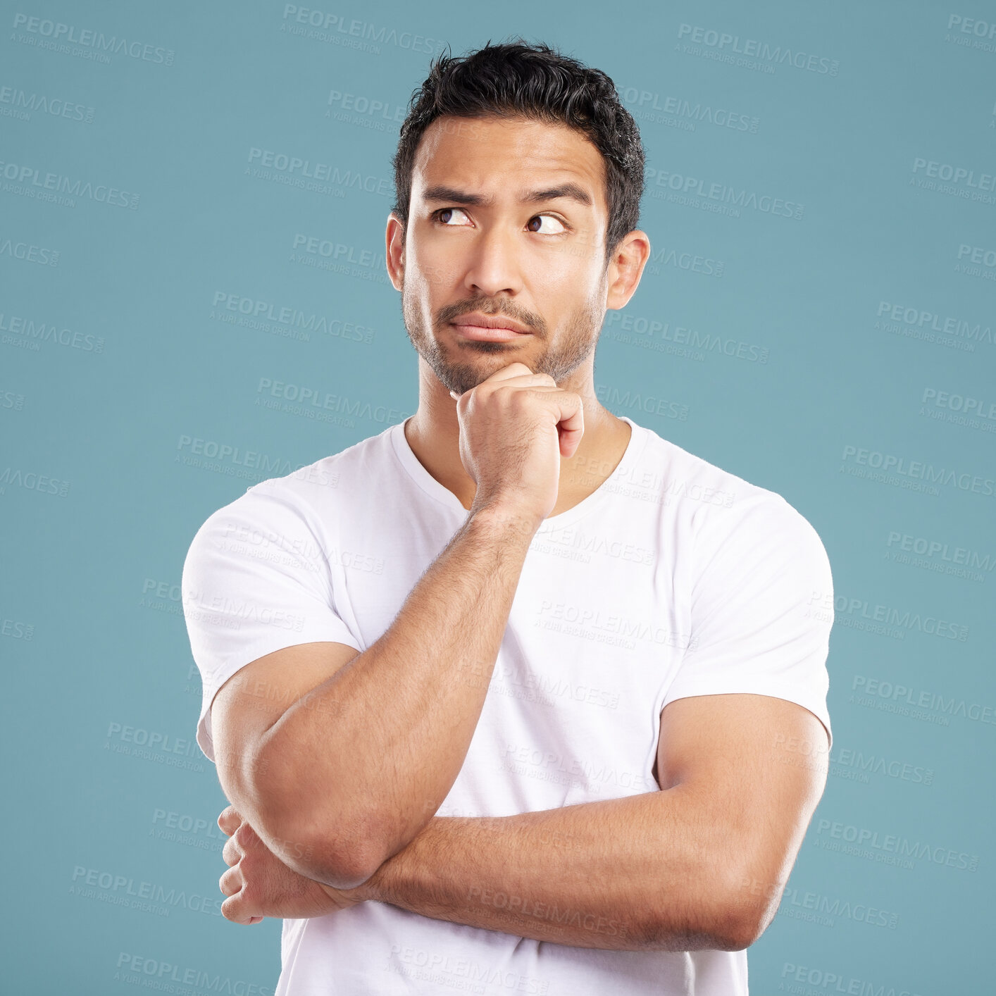 Buy stock photo Man, thinking and idea in studio for decision, planning and problem solving on blue background. Student, person and thought for creative solution, project insight and choice by mock up space