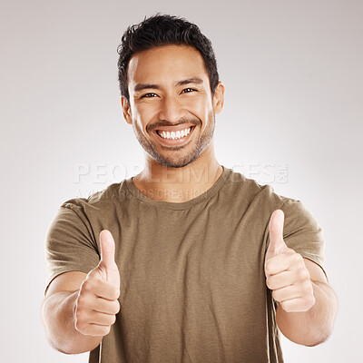 Buy stock photo Man, happy and portrait with thumbs up in studio for support, agreement and positive review of promotion. Success, person and like emoji on gray background for sale approval, yes sign and thank you