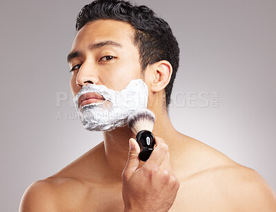 Buy stock photo Cream, beard and man with brush in studio for grooming routine, hair removal or shaving preparation. Topless person, portrait or foam application for depilation, self care or space on gray background