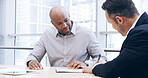 Businessmen, writing or signing with contract for corporate policy, negotiation or legal agreement at office. Business people, employee or coworker with paperwork for assets, partnership or b2b deal