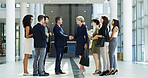 CEO, business people and shaking hands in office for welcome, b2b introduction or greeting. Happy group, collaboration and handshake for agreement, deal or company merger with financial acquisition