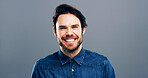 Happy man, portrait and laughing with joke in studio for funny humor or comedy on a gray background. Face, male person or handsome model with smile, clothing or style in denim jacket on mockup space