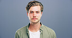 Worker, professional and portrait of man in studio for staff ID, company card and about us. Business, entrepreneur and face of isolated person for career, job and employee profile on blue background