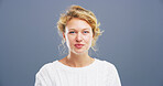 Business, portrait and space with woman receptionist in studio for professional company assistance. Agency, confident and mockup with assistant or secretary on gray background for office management