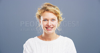 Buy stock photo Portrait, smile and space with student woman in studio for college, school or university study. Confident, education and mockup with German person on gray background for development or learning