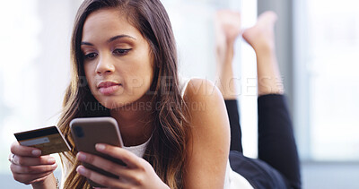 Buy stock photo Home, woman and payment with smartphone for credit card, information and banking app for ecommerce. House, female person and reading with mobile for debit details, online shopping or web subscription