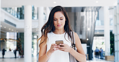 Buy stock photo Business. woman and phone for reading in lobby for notification, social media post or online communication. Female person, mobile app for chat or check email from professional contact at workplace