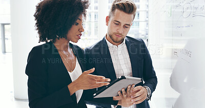 Buy stock photo Business people, tablet and discussion with whiteboard for strategy, planning or meeting in office. Businessman, woman or employees for conversation, advice and training for research or brainstorming