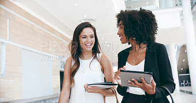 Buy stock photo Business women, smile and talk in lobby for confidence, professional and career in news agency. Journalist, editor and tablet in office for company development, consultant or pride for occupation