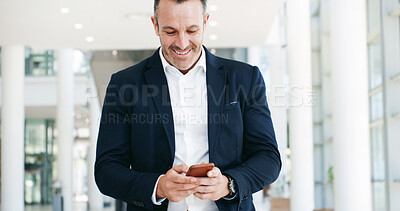 Buy stock photo Walking, phone and business man in office for email, networking and communication in lobby. Professional, corporate and worker on smartphone for internet, research and online planning on mobile app