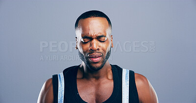 Buy stock photo Sad, African man and crying tears in studio with depression, mourning loss and emotional memory. Person, grief and mockup space with mental health crisis, bad news and ptsd trauma on gray background