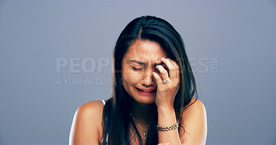 Buy stock photo Heartbreak, crying and woman with tears, studio or sad for loss of toxic relationship, grief or emotional. Mockup space, gray background and person with depression for breakup, disappointed or trauma