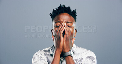 Buy stock photo Sad, black man and crying tears in studio with depression, mourning loss and emotional for memory. Male person, grief and sorrow with mental health crisis, bad news and PTSD trauma on gray background