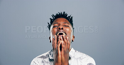 Buy stock photo Black man, grief and crying tears in studio with depression, mourning loss and emotional memory. Person, sad and mockup space with mental health crisis, bad news and PTSD trauma on gray background