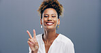 Girl, peace sign and happy in studio, excited and icon with v symbol for victory by background. Woman, shouting and smile with emoji, fashion and playful in portrait with hand gesture in Costa Rica