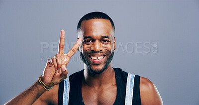 Buy stock photo Black man, peace sign and happy in studio portrait, icon and v symbol for victory by background. Model, person and style with pride, smile and emoji with fashion, vote and hand gesture in Nigeria