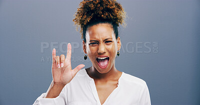 Buy stock photo Rocker, hand and edgy with portrait of woman in studio for metal music, punk identity and crazy. Devil horn sign, funky and attitude with African person on background for energy, emoji and expression