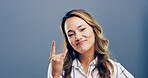 Rocker, hand and funky with portrait of woman in studio for metal music, punk identity and crazy. Devil horn sign, edgy and attitude with person on background for energy, emoji and expression
