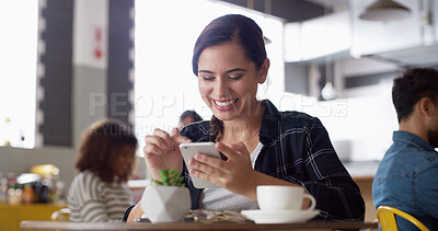 Buy stock photo Smile, network and woman in cafe, smartphone and typing with connection, funny meme and relax. Person, texting or girl in restaurant, coffee and cellphone with digital app, communication and internet