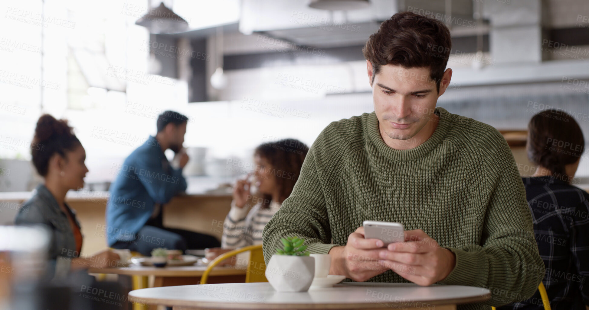 Buy stock photo Phone, coffee and man in cafe reading online blog for hospitality review in morning. Networking, cellphone and male influencer with cappuccino for content creation for restaurant recommendation.