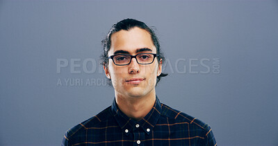 Buy stock photo Glasses, portrait and space with man in studio for intelligence, optometry or vision. Confident, eyewear and mockup with serious model isolated on gray background for prescription frame or lens