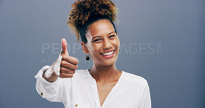Buy stock photo Thumbs up, yes and portrait of woman in studio for approval, success and feedback. Like emoji, sign and agreement with african person and smile on background for vote, symbol and promotion icon 