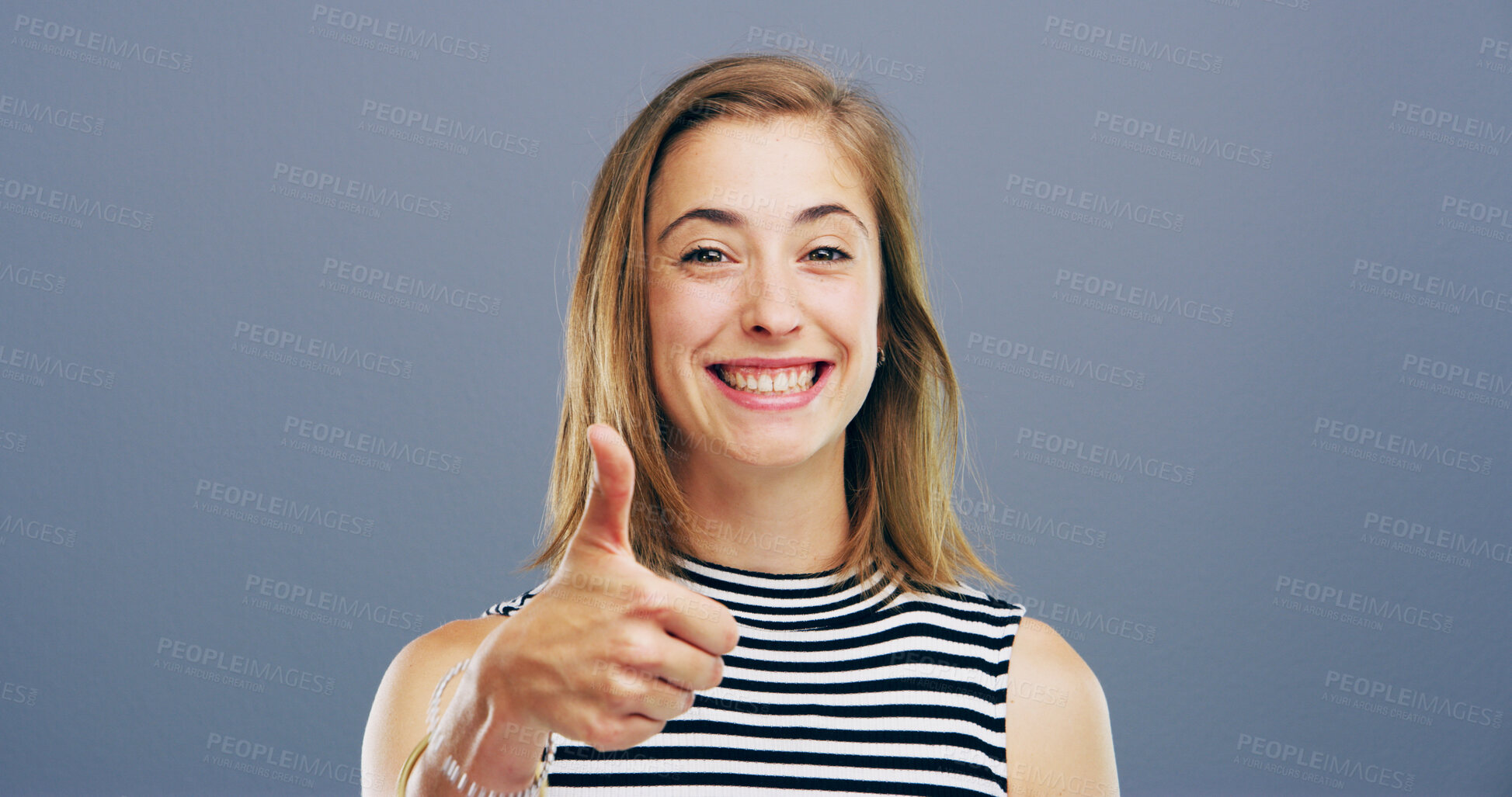 Buy stock photo Thumbs up, smile and yes with portrait of woman in studio for approval, success and feedback. Like emoji, sign and agreement with person on gray background space for vote, symbol and promotion icon