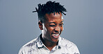 Wink, secret and portrait of black man in studio for smile, agreement and support gesture. Happiness, feedback and thank you with male person on background for review, achievement and well done sign