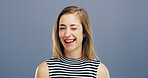 Wink, smile and support with portrait of woman in studio for secret, agreement and joy. Happiness, feedback and thank you with female person on background for review, achievement and well done sign
